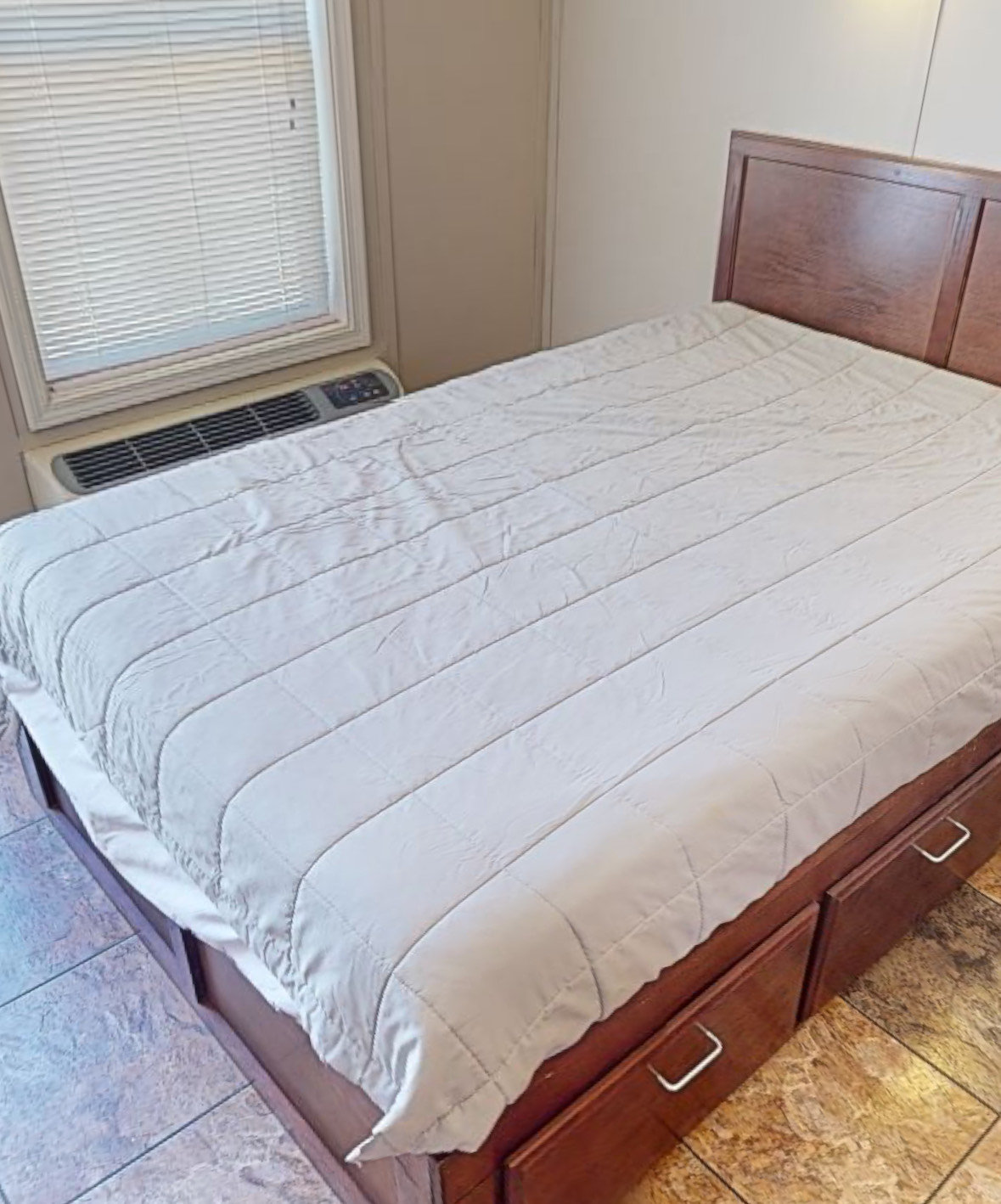 Furnished bedroom with storage